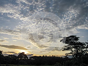 Sunset covered by black clouds