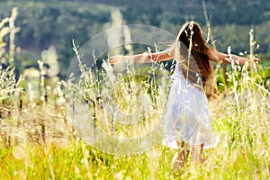 Sunset dancing meadow girl photo