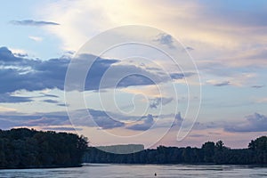 Sunset on the Danube river with beautiful sky and clouds