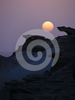 Sunset in desert mountain landscape