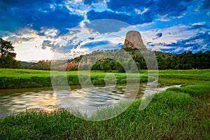 Sunset at Devils Tower National Monument with the Belle Fourche River in the foreground photo