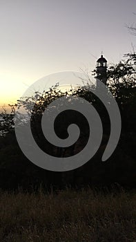 Sunset at Diamond Head Lighthouse in Winter on Oahu Island, Hawaii.