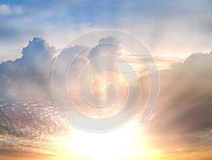 Sunset at  dramatic  sunset blue fluffy clouds ,bright sunbeam , cloudy sky nature landscape  background weather forecast