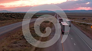 Sunset Drive: Semi Trucks in Desert Steppe
