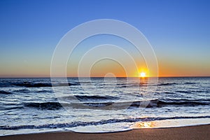 Sunset at Dunas Douradas beach seascape, famous destination photo