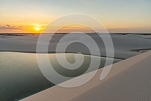 Sunset at the dunes and Lake - Santo Amaro, LenÃÂ§ois Maranhenses, MaranhÃÂ£o, Brazil. photo