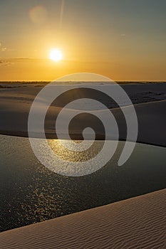 Sunset at the dunes and Lake - Santo Amaro, LenÃ§ois Maranhenses, MaranhÃ£o, Brazil.