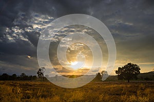 Sunset at Dusk over grassland valley