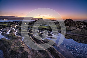 Sunset at El Confital beach, La Isleta peninsula, Gran Canaria, Spain