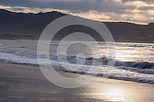 Sunset evening walk on hendaye beach, basque country, france