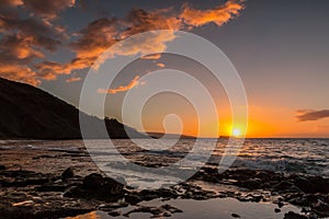 Sunset on The Exposed Lava Reef of Oneuli Beach