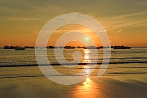 Sunset with fisher boats Ngwe Saung Beach Myanmar photo