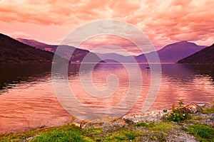 Sunset in fjord Hardanger Norway