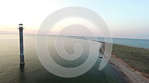 Sunset flight with the leaning Kiipsaare lighhouse in Estonia