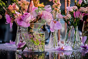 Sunset. Flowers. Candles. Wedding decoration. Floral arrangements