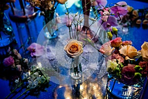 Sunset. Flowers. Candles. Wedding decoration. Floral arrangements