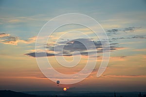 Sunset and flying balloon