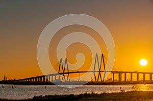 SUNSET AT THE Fred Hartman Bridge