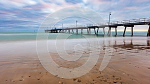 Sunset at the Pier on a Cloudy Day