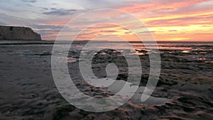 Sunset Glow on Coastal Tide Pools and Cliffs