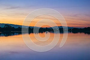 After sunset glow reflected on a lake surface, Shoreline Park, Mountain View, San Francisco bay area, California