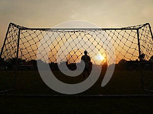 Sunset with goalkeeper