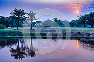 Sunset at the golf course lake.