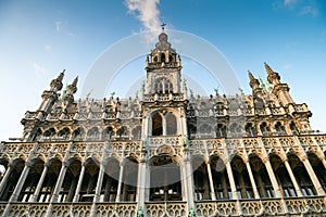 Sunset in Grand Place Market of Brussels in Belgium with blue sky and warm light