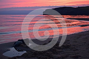 Sunset.Great Lake Baikal overlooking the mountains, Small Sea Olkhon Island