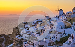 Sunset at the Greek village of Oia Santorini Greece with a view over the ocean caldera