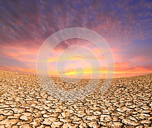 Sunset on the ground dried by dryness