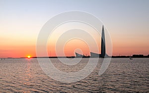 Sunset on the Gulf of Finland and view of the Lakhta center skyscraper