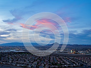 Sunset high angle view of the Frenchman Mountain and cityscape from Henderson View Pass