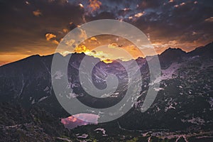 Sunset panorama in High Tatras mountains national park. Mountain popradske lake in Slovakia.