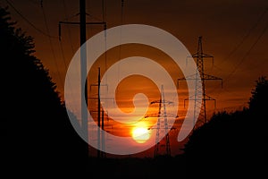Sunset in high-voltage line