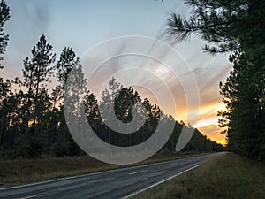 Sunset by the highway roadside