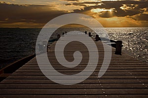 Sunset on the Horizon in Cayman Islands, Long Boardwalk to the Ocean