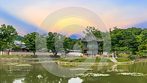 Sunset at the Hyangwonjeong Pavilion in the center of the pond in the Gyeongbokgung palace