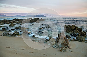 Sunset in idyllic beach of Kleinmond photo