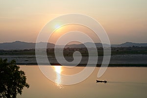 Sunset at Irrawaddy river in New Bagan, Myanmar Burma