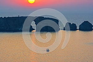 Sunset at the island of Sfaktiria near the town of Pylos in Peloponnese, Greece