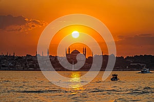 Sunset in istanbul, silhouette of the historical peninsula. Sunset over Hagia Sophia