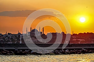 Sunset in istanbul, silhouette of the historical peninsula. Sunset over Hagia Sophia and Historical Peninsula