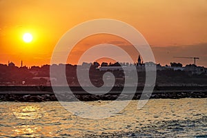 Sunset in istanbul, silhouette of the historical peninsula. Sunset over TopkapÄ± Palace and Historical Peninsula