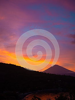 Sunset at Jemeluk bay overlooking Mt. Agung in Bali
