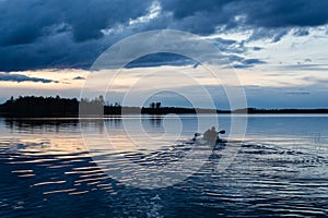 Sunset kayaking at lake