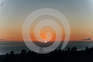 sunset on Kekaha Lookout in kauai, hawaii photo