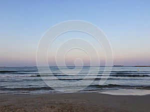 Sunset on the La-Pineda beach in Spain