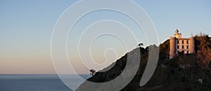 Sunset at the La Plata lighthouse on Mount Ulia, Euskadi