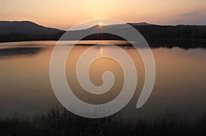 At sunset on Lake Banyoles , Girona